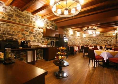 Ресторант или друго място за хранене в Gioras Hotel
