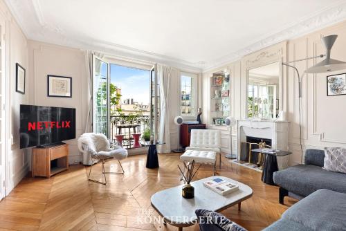 Haussmannian 3BDR Apartment with Balcony
