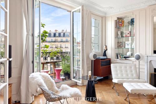 Haussmannian 3BDR Apartment with Balcony
