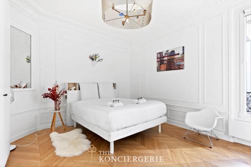 Haussmannian 3BDR Apartment with Balcony