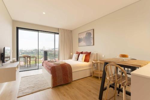 Open Living Studio with Pool & Garage by HostWise