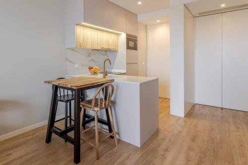 Open Living Studio with Pool & Garage by HostWise