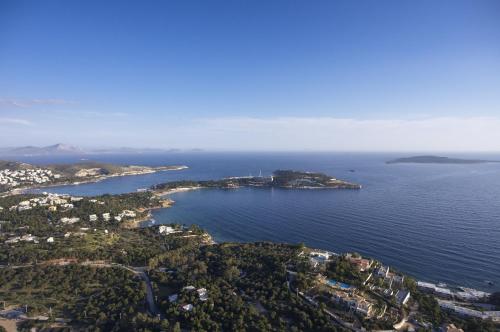 an aerial view of an island in the water at Amarilia Hotel in Athens