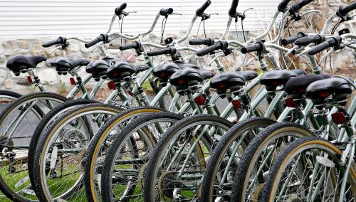 a bunch of bikes parked in a row at Peninsula Park-View Resort in Fish Creek