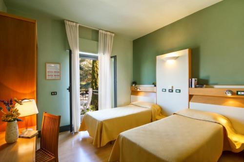 Postel nebo postele na pokoji v ubytování Duca Del Mare - Hotel Di Nardo group