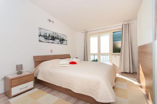 Posteľ alebo postele v izbe v ubytovaní Apartment Lelas