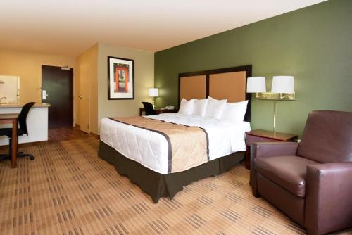 a bedroom with a bed and a desk and a chair at Extended Stay America Suites - South Bend - Mishawaka - North in South Bend