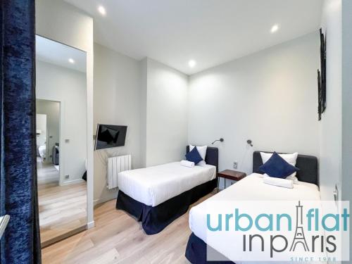 UrbanFlat 64 -Grand appartement haut de gamme - Triangle d Or parisien