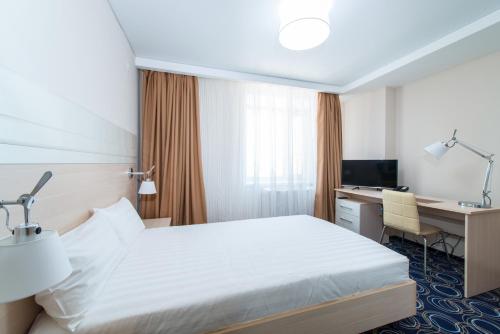 Кровать или кровати в номере Apart Hotel 92/2