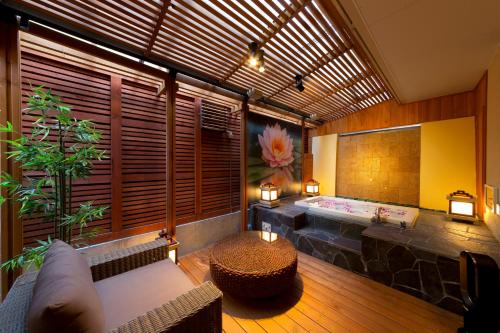 a room with a jacuzzi tub in a building at Hotel Lotus Nara (Adult Only) in Nara
