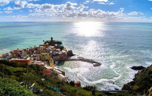 an aerial view of a town on the shore of the ocean at Cuccaro Club - Val di Vara e Cinque Terre in Rocchetta di Vara