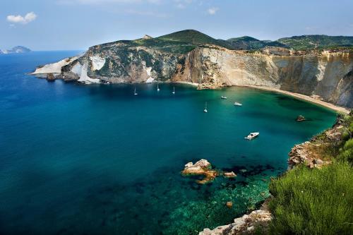 an aerial view of a beach with boats in the water at Monolocali Giancos in Ponza