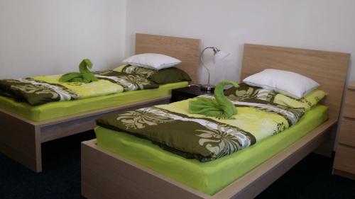 Postel nebo postele na pokoji v ubytování Ubytování Němčičky