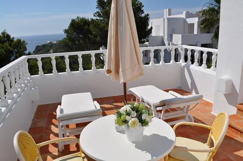 
A balcony or terrace at Hotel Village
