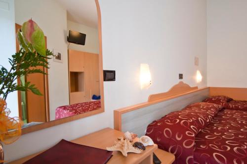 Postel nebo postele na pokoji v ubytování Hotel Hamilton