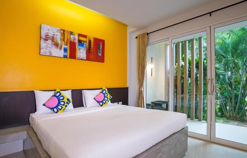 Postel nebo postele na pokoji v ubytování The Fong Krabi resort