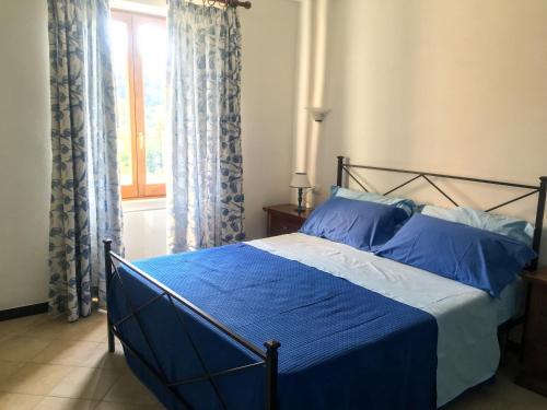 Postel nebo postele na pokoji v ubytování Agriturismo La Ferriera