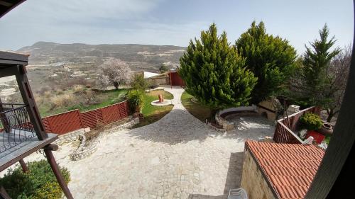 an aerial view of a house with a garden at Stou Kir Yianni in Omodos