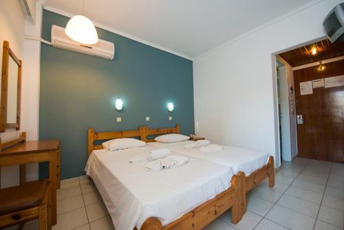 Postel nebo postele na pokoji v ubytování International Hotel