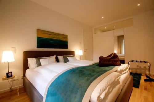 Posteľ alebo postele v izbe v ubytovaní Donaupromenade