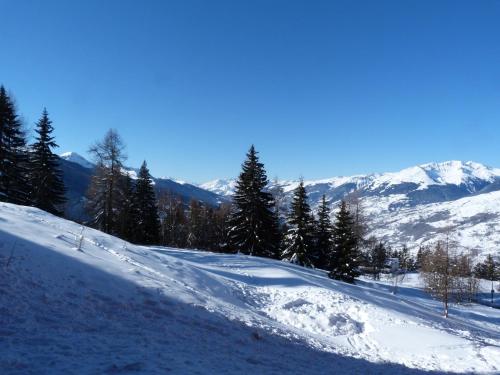 Résidence Armoise - Appartement de charme 2 pièces / 6 personnes à Arc 1800 en centre station, proche des pistes et des commerces, dans le village d MAE-1694