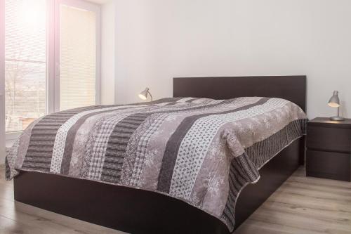 Postel nebo postele na pokoji v ubytování Garden apartments
