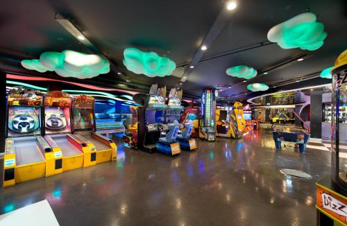 a arcade with several video games in a room at Akra V - Access to Akra Antalya in Antalya