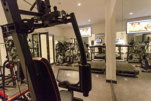 a gym with a lot of exercise equipment at Nacala Plaza Business Design Hotel in Cidade de Nacala
