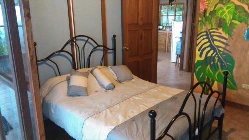 Ein Bett oder Betten in einem Zimmer der Unterkunft Finca Y Granja Loma Bonita