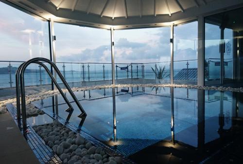 a swimming pool on the top of a building at Cary Arms & Spa in Torquay