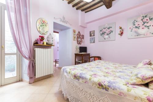 Ένα ή περισσότερα κρεβάτια σε δωμάτιο στο Bed and Breakfast Sognando Te