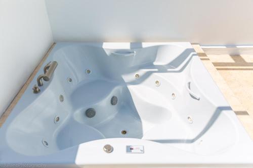 a jacuzzi tub in a room at SBV Luxury Ocean Hotel Suites in Miami Beach
