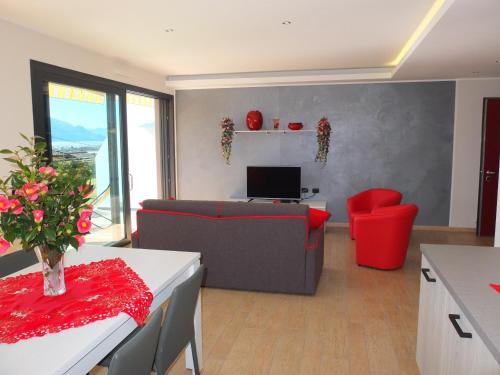 a living room with a couch and a table at BELLA VITA Residence in Gravedona