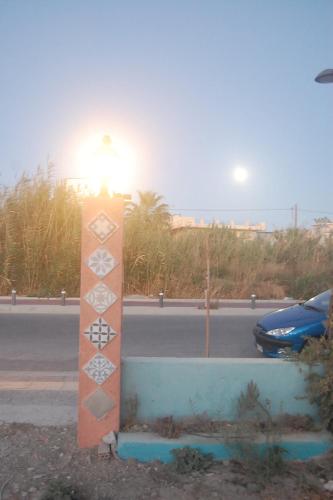a street sign on the side of a road at Violetta Hotel in Amoudara Herakliou