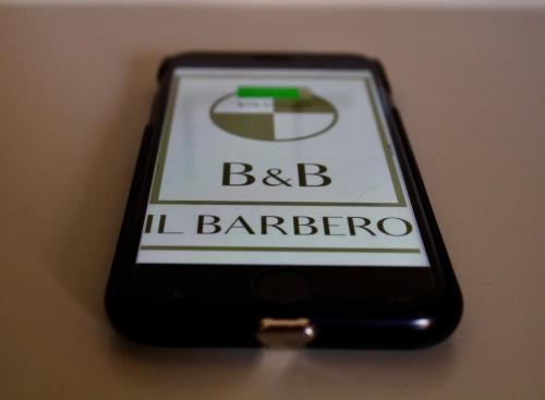 a cell phone with the bbcigil barbero on it at B&B il Barbero in Siena