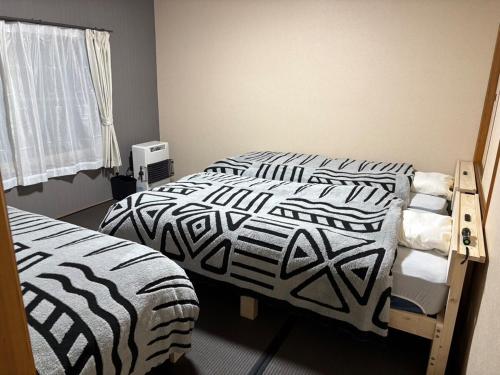 NewOpen 札幌中心部まで10分 好立地の一棟貸切り-S-beds-9台-駐車場2台有り-ゲストハウスR