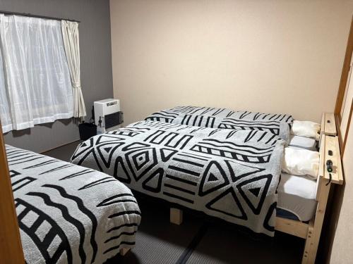 NewOpen 札幌中心部まで10分 好立地の一棟貸切り-S-beds-9台-駐車場2台有り-ゲストハウスR