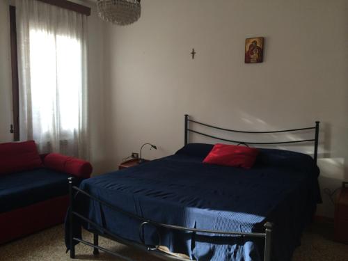 Cama o camas de una habitación en Appartamento la Garzetta