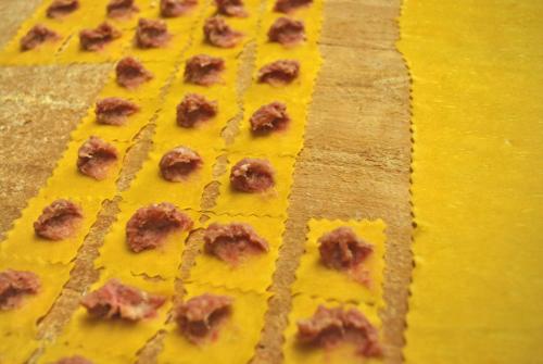 a close up of food on a yellow cutting board at Il Murello in Fiorentina
