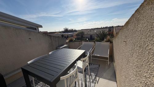 Studio plage et village