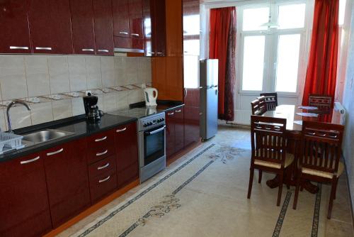 Kjøkken eller kjøkkenkrok på Cima Apartment