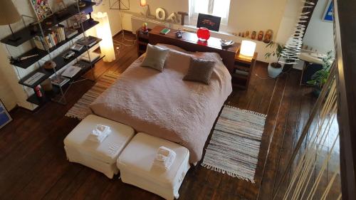 an overhead view of a living room with a couch at Manoir de la Peylouse in Saint-Venant
