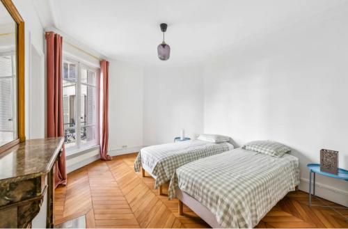 Élégant appartement typique Parisien haussmannien de 106 m2 Bassin de la Villette