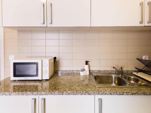 4D- Wake Up in Central Lisbon, Where History Meets Everyday Local Life