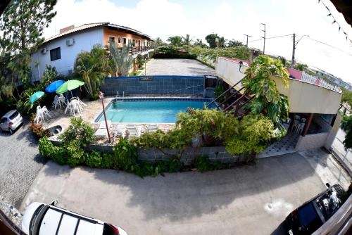 Pemandangan kolam renang di Pousada Recanto de Minas atau di dekatnya