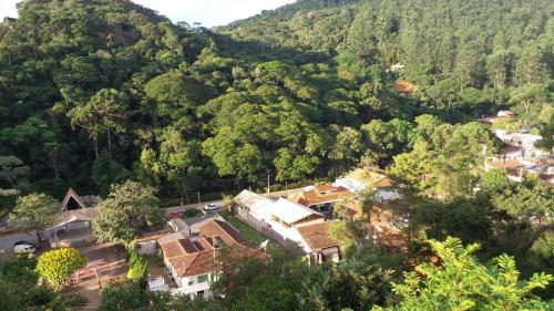 an aerial view of a village in a mountain at Pousada Pinhalense in Santo Antônio do Pinhal