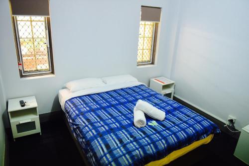 Cama o camas de una habitación en The Emperors Crown Hostel