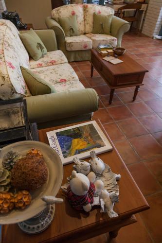 a living room with a couch and a table at Charmole in Wujie