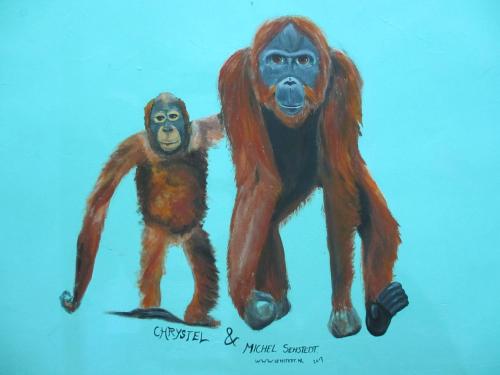 a painting of a mother and baby gorilla at Sandakan Backpackers Hostel in Sandakan