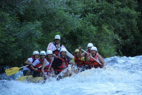 a group of people on a raft in a river at Villa Pia Split in Kaštela